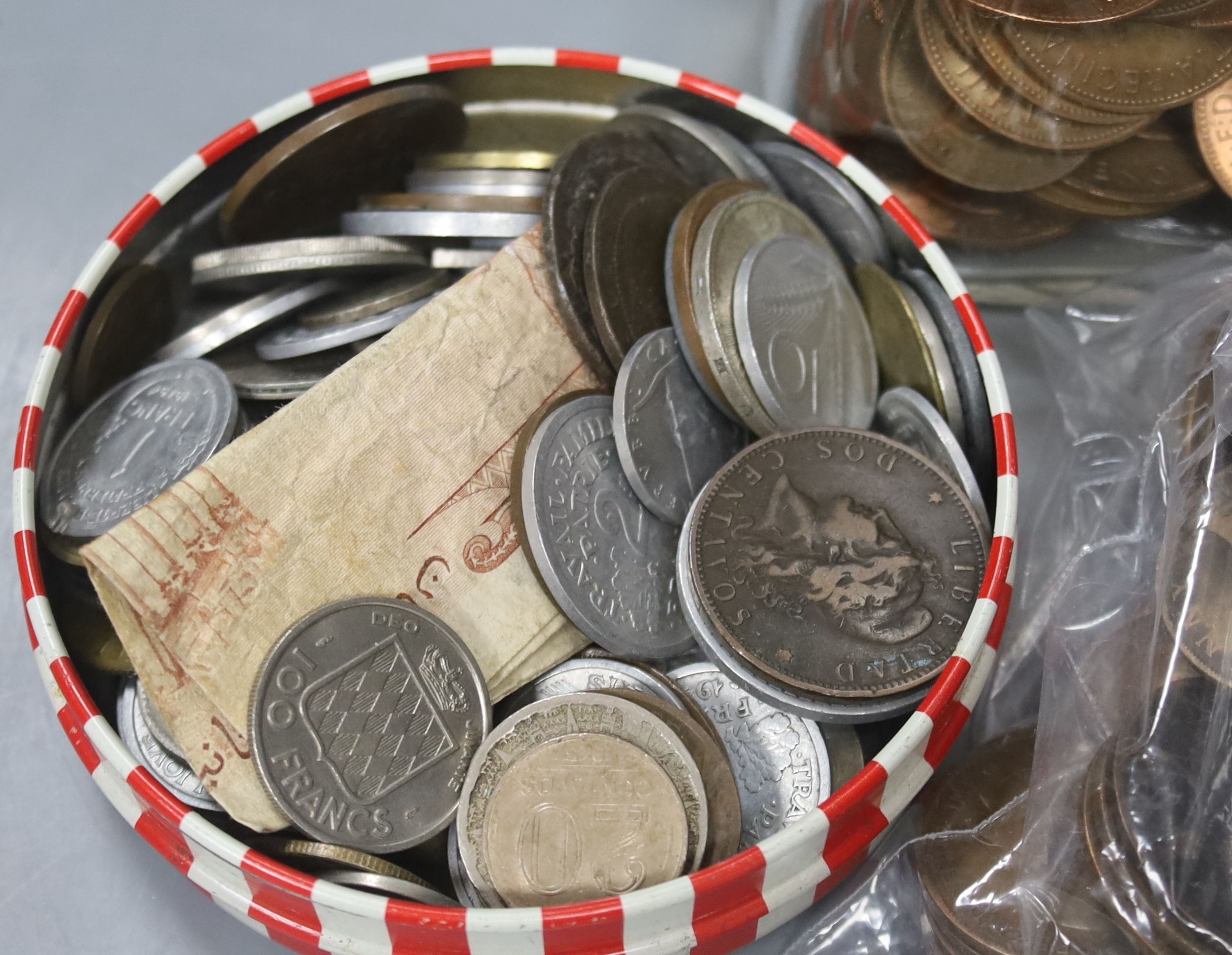 A group of UK pennies and half pennies and 20th century European coins